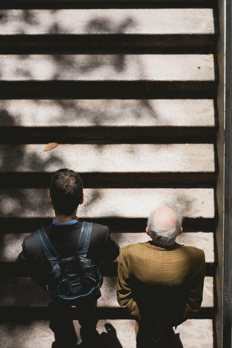 Older adult climbing a staircase outdoors